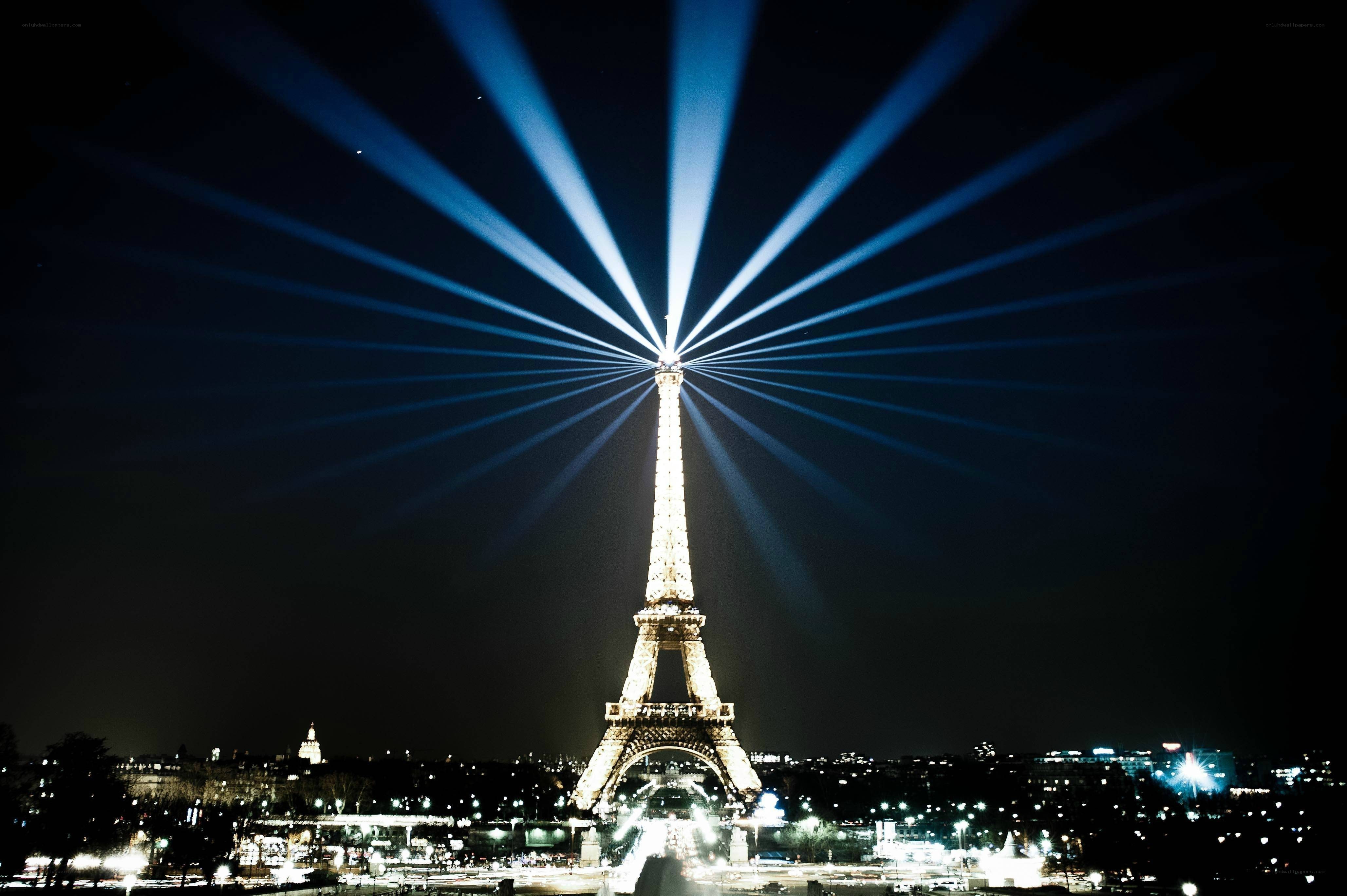 Eiffel Tower at night with lights