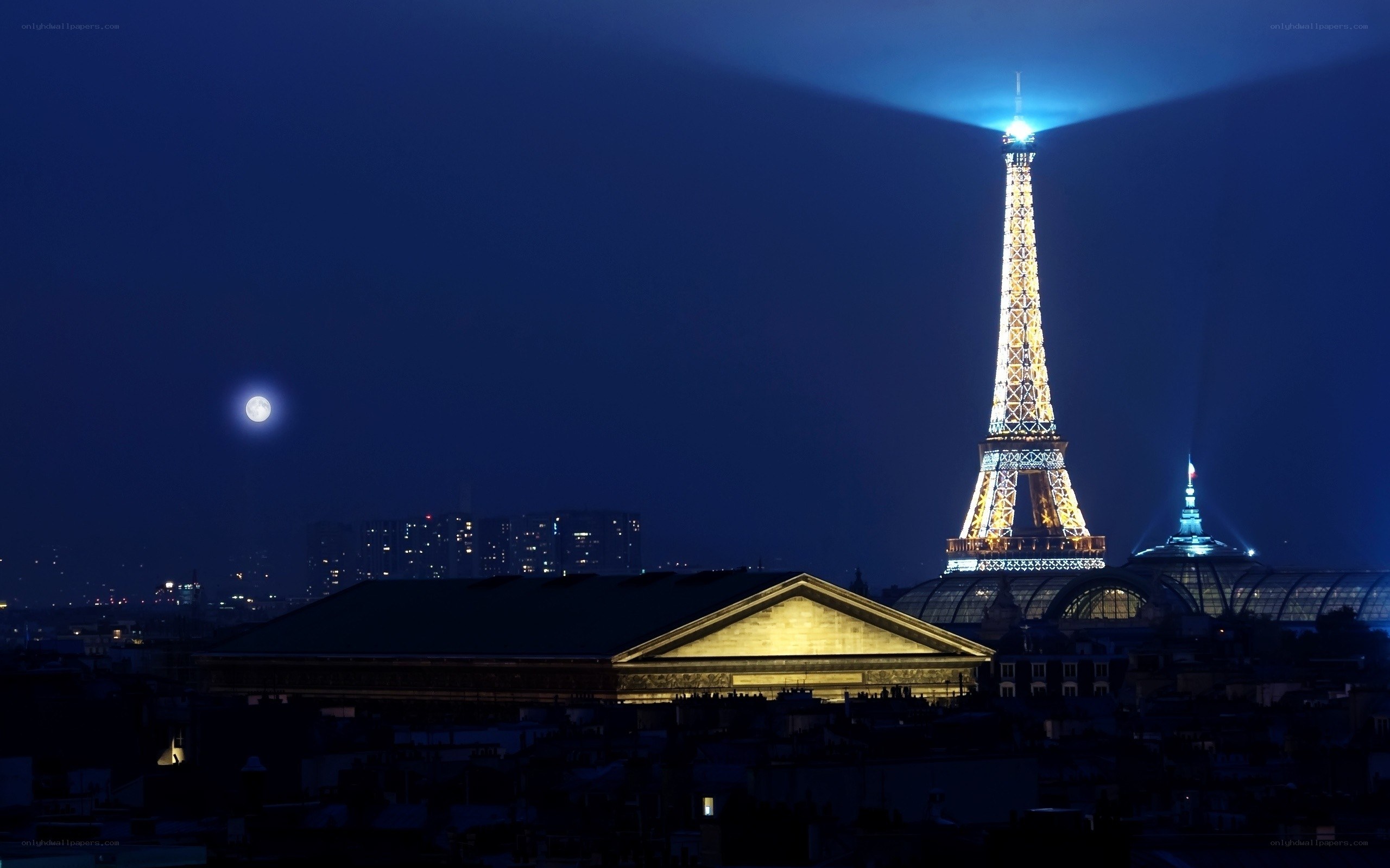 Eiffel Tower at night with moon