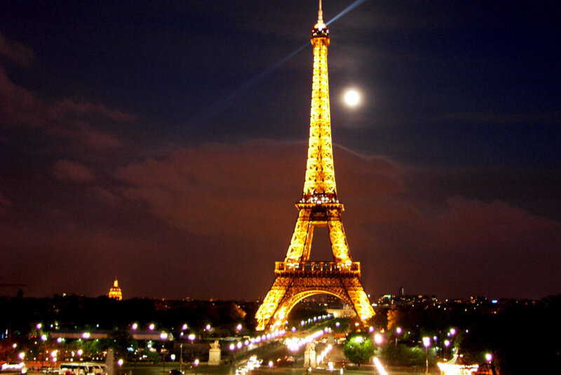 Eiffel Tower at night with moon