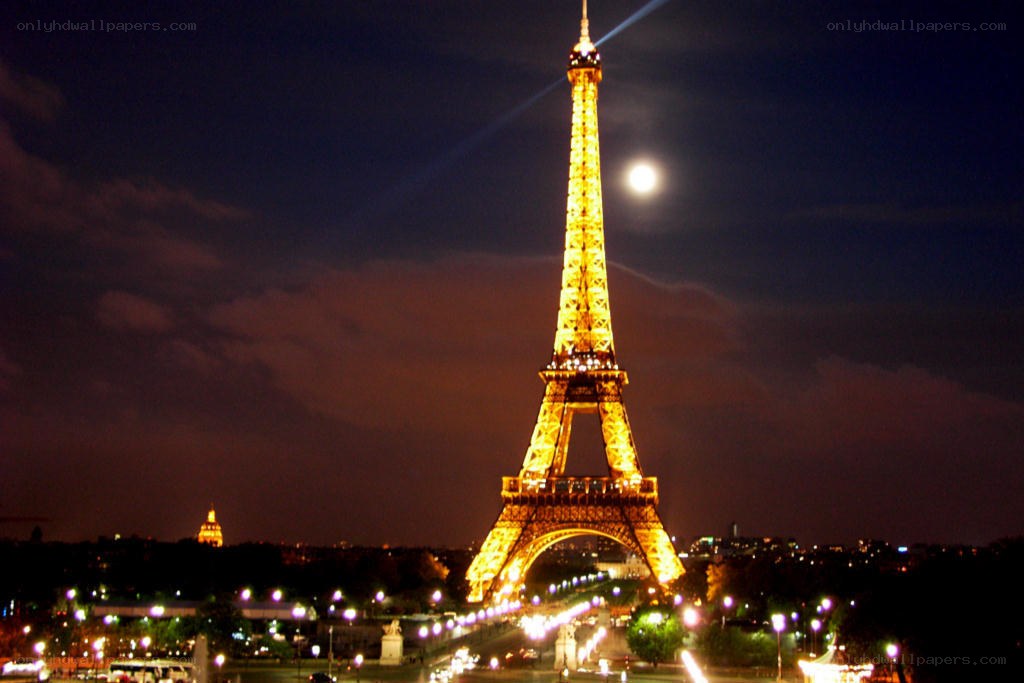 Eiffel Tower at night with moon