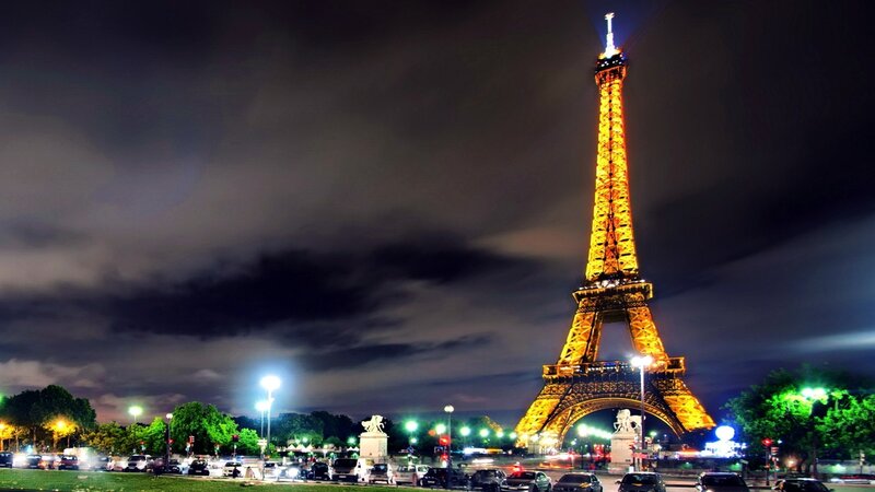Eiffel Tower at Night — Yellow, Dramatic, Photograph, Cars, Trees