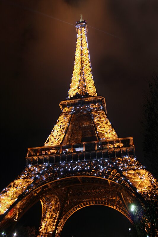 Eiffel Tower at Night — Yellow, Dramatic, Photograph, Lights, Night Sky