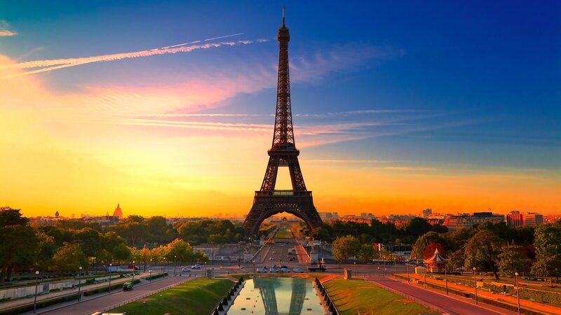 Eiffel Tower at Sunset — Blue, Dramatic, Photograph, Sky, Trees, Road, Orange, Yellow