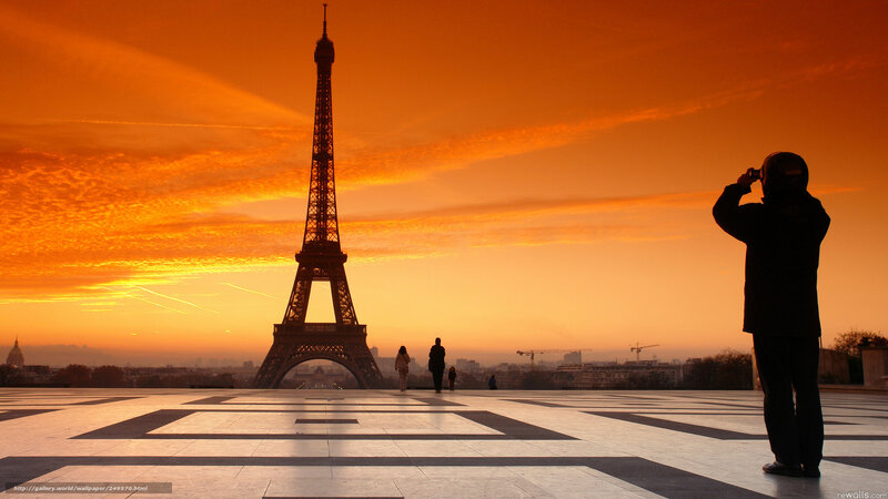 Eiffel Tower at Sunset — Orange, Dramatic, Photograph, Person
