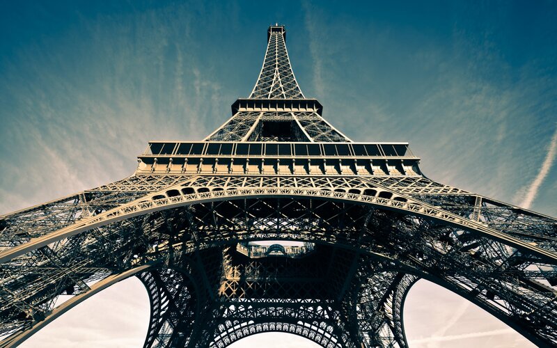 Eiffel Tower Base — Blue, Dramatic, Afternoon, Photograph