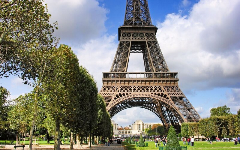 Eiffel Tower Base — Blue, Outdoor, Afternoon