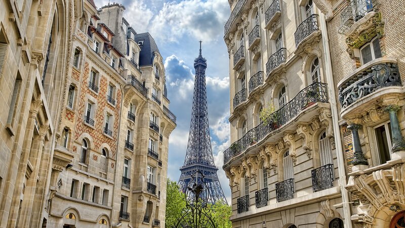 Eiffel Tower Between Buildings