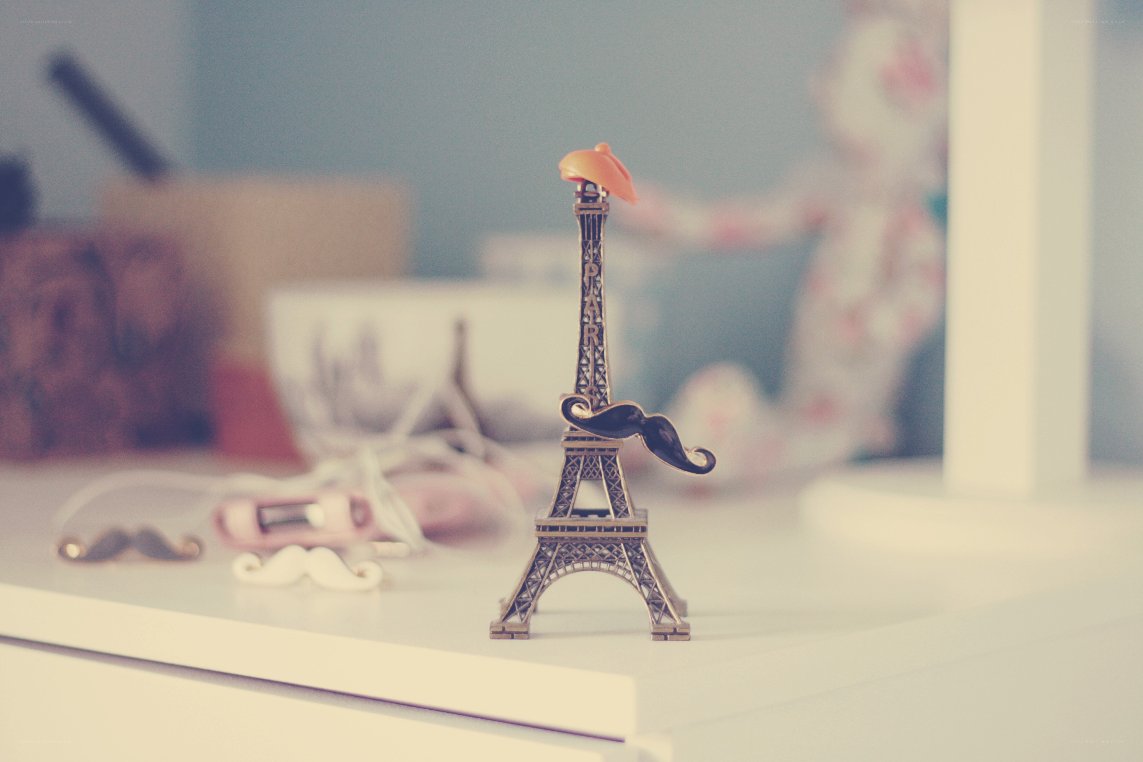 Eiffel Tower figurine with mustache