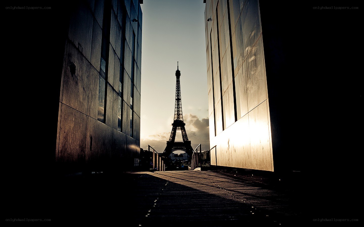 Eiffel Tower framed by buildings