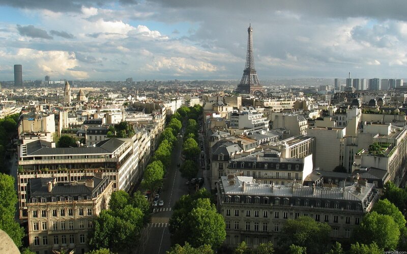 Eiffel Tower in Paris — Gray, Dramatic, Afternoon, Photograph, Buildings