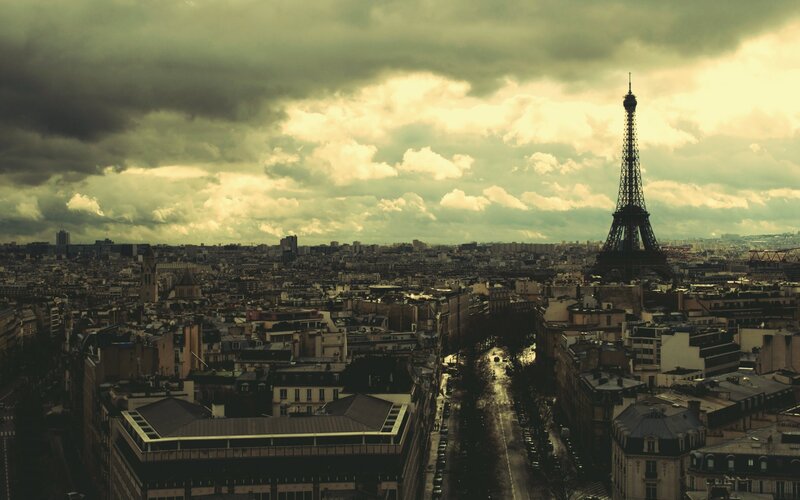Eiffel Tower in Paris — Gray, Dramatic, Afternoon, Photograph, Cityscape, Clouds, Buildings, Yellow