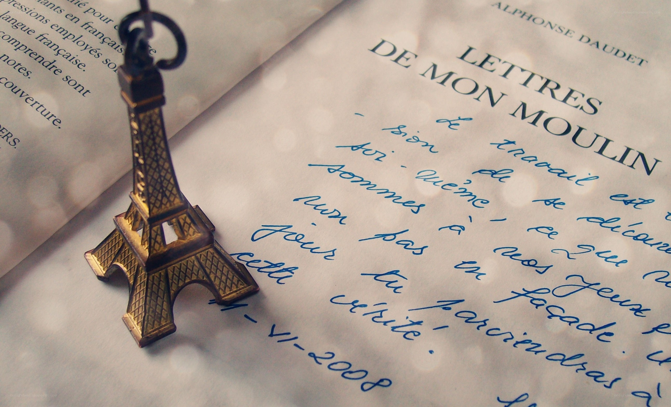 Eiffel Tower keychain on letter