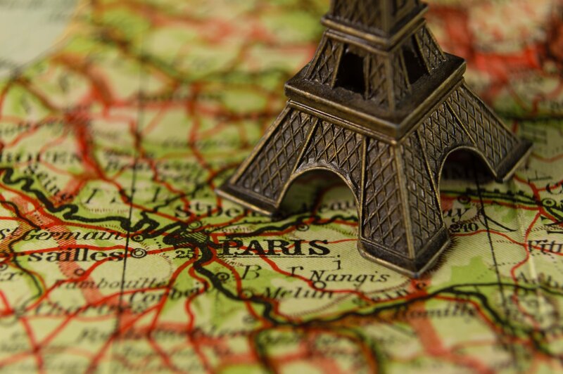 Eiffel Tower model on Paris map