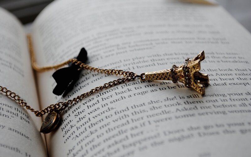 Eiffel Tower Necklace on Book