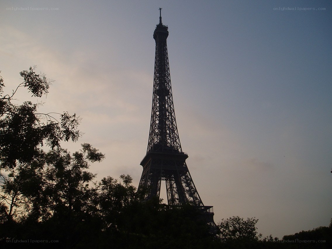 Eiffel Tower silhouette at dusk