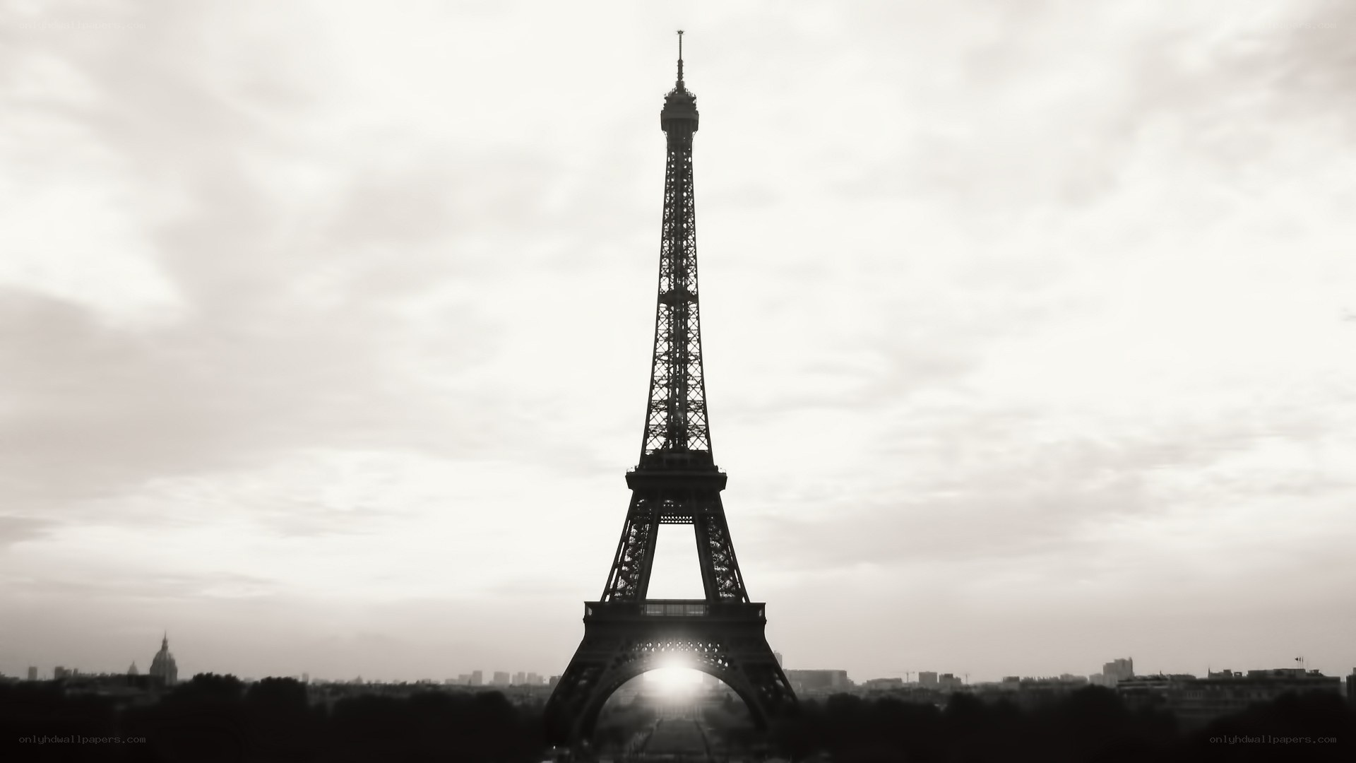 Eiffel Tower silhouette at sunrise