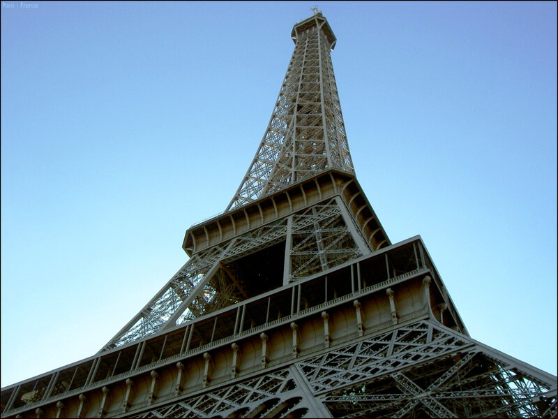 Eiffel Tower Structure — Blue, Dramatic, Afternoon, Photograph, Sky, Gray