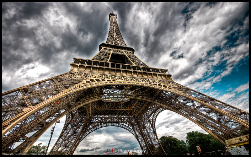 Eiffel Tower Structure — Gray, Dramatic, Afternoon, Photograph, Clouds