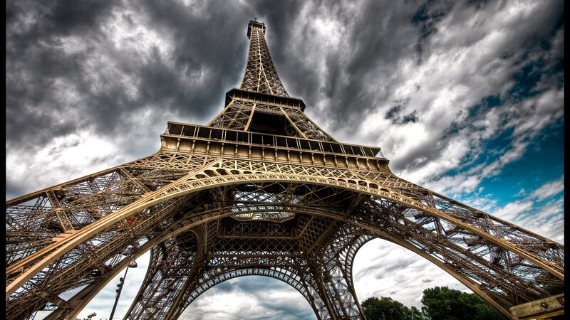 Eiffel Tower Structure — Gray, Dramatic, Photograph, Clouds