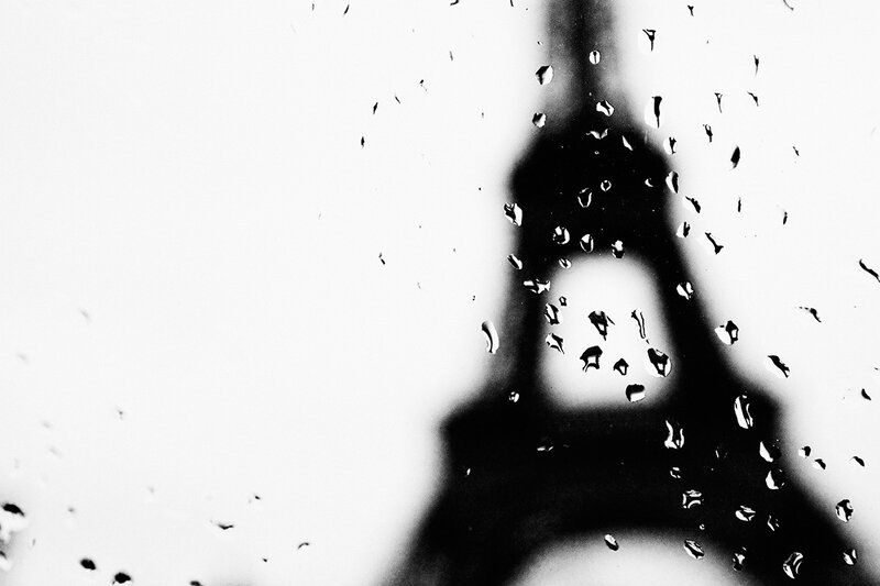 Eiffel Tower through raindrops