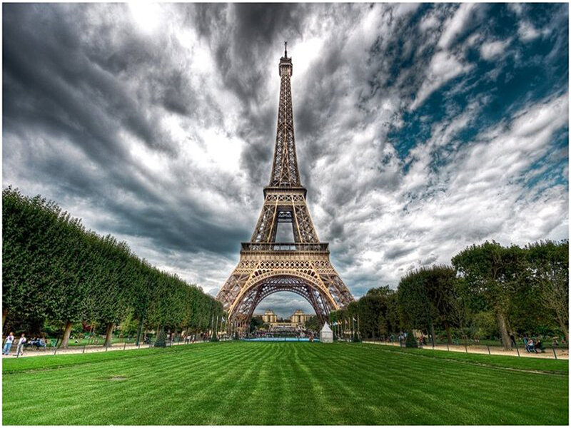 Eiffel Tower under dramatic sky