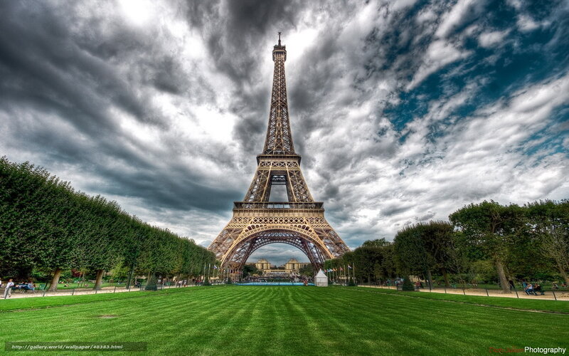 Eiffel Tower under dramatic sky