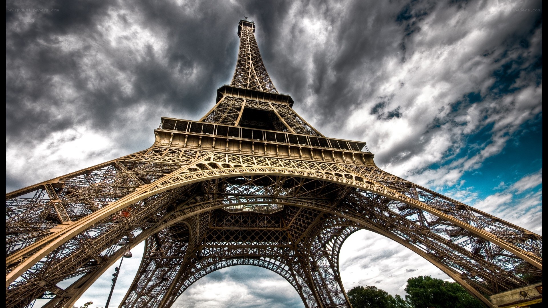 Eiffel Tower under stormy sky