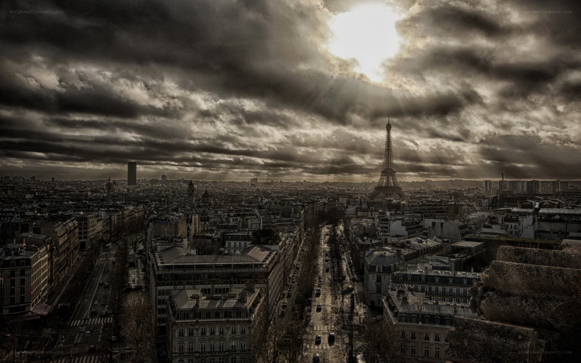 Eiffel Tower under stormy sky