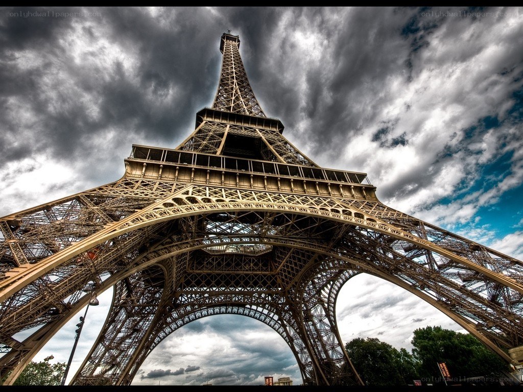 Eiffel Tower under stormy sky