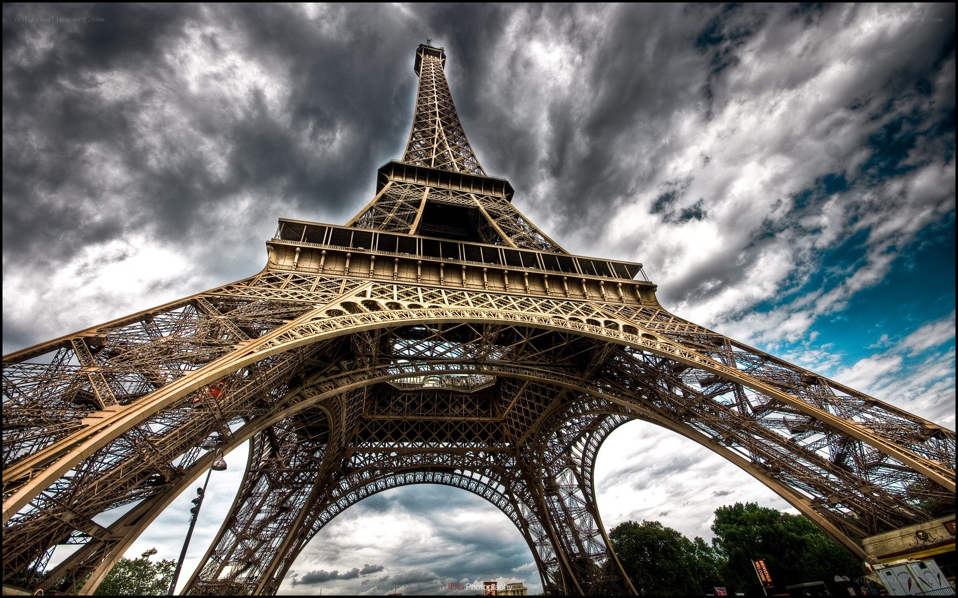 Eiffel Tower under stormy sky