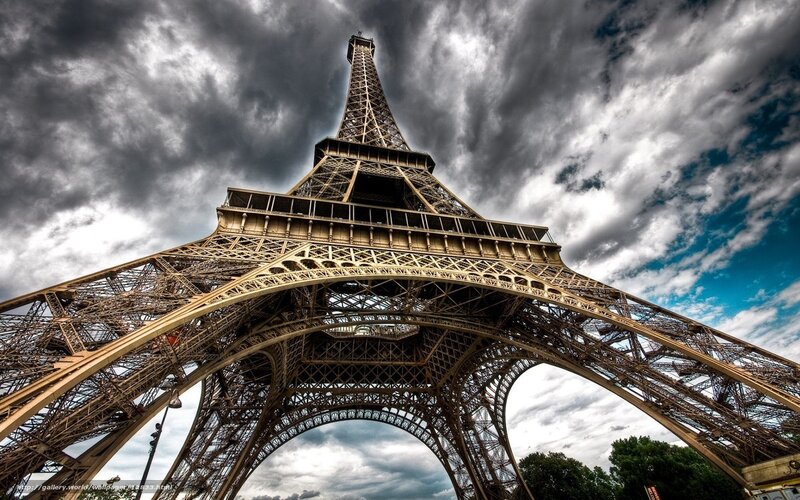 Eiffel Tower under stormy sky