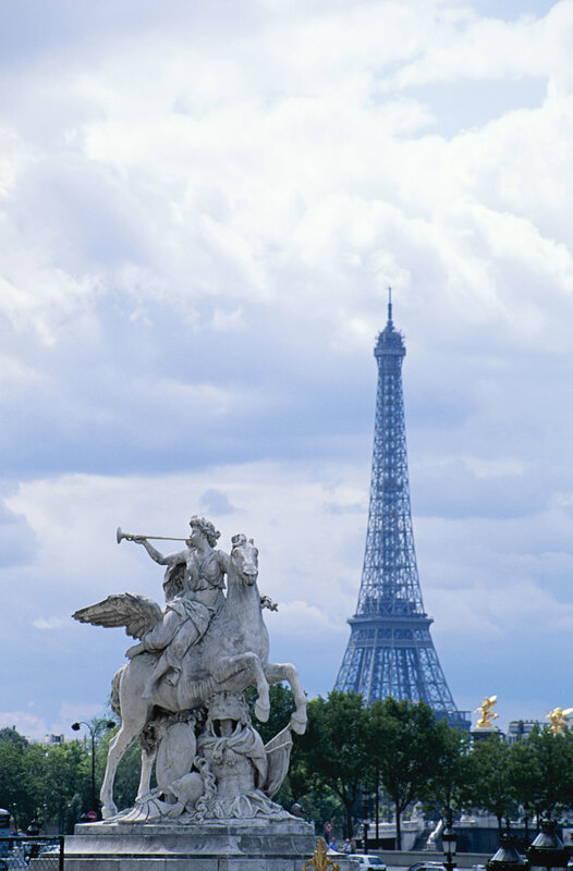 Eiffel Tower with statue