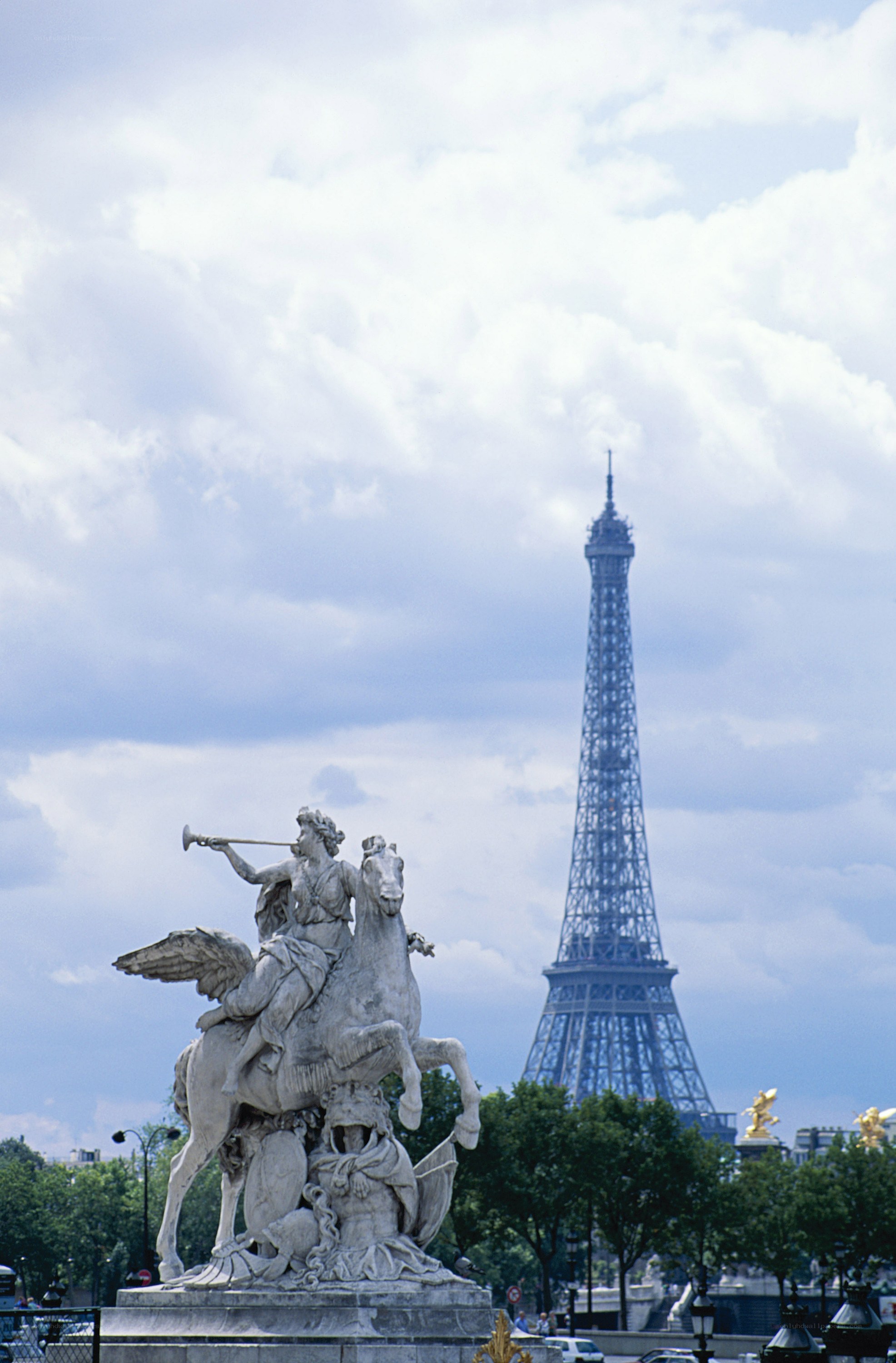 Eiffel Tower with statue