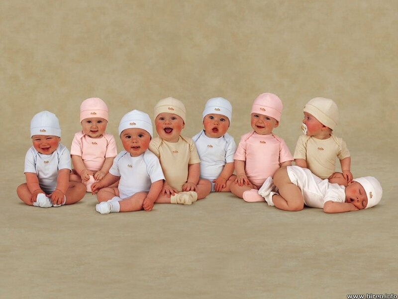 Eight Babies Sitting