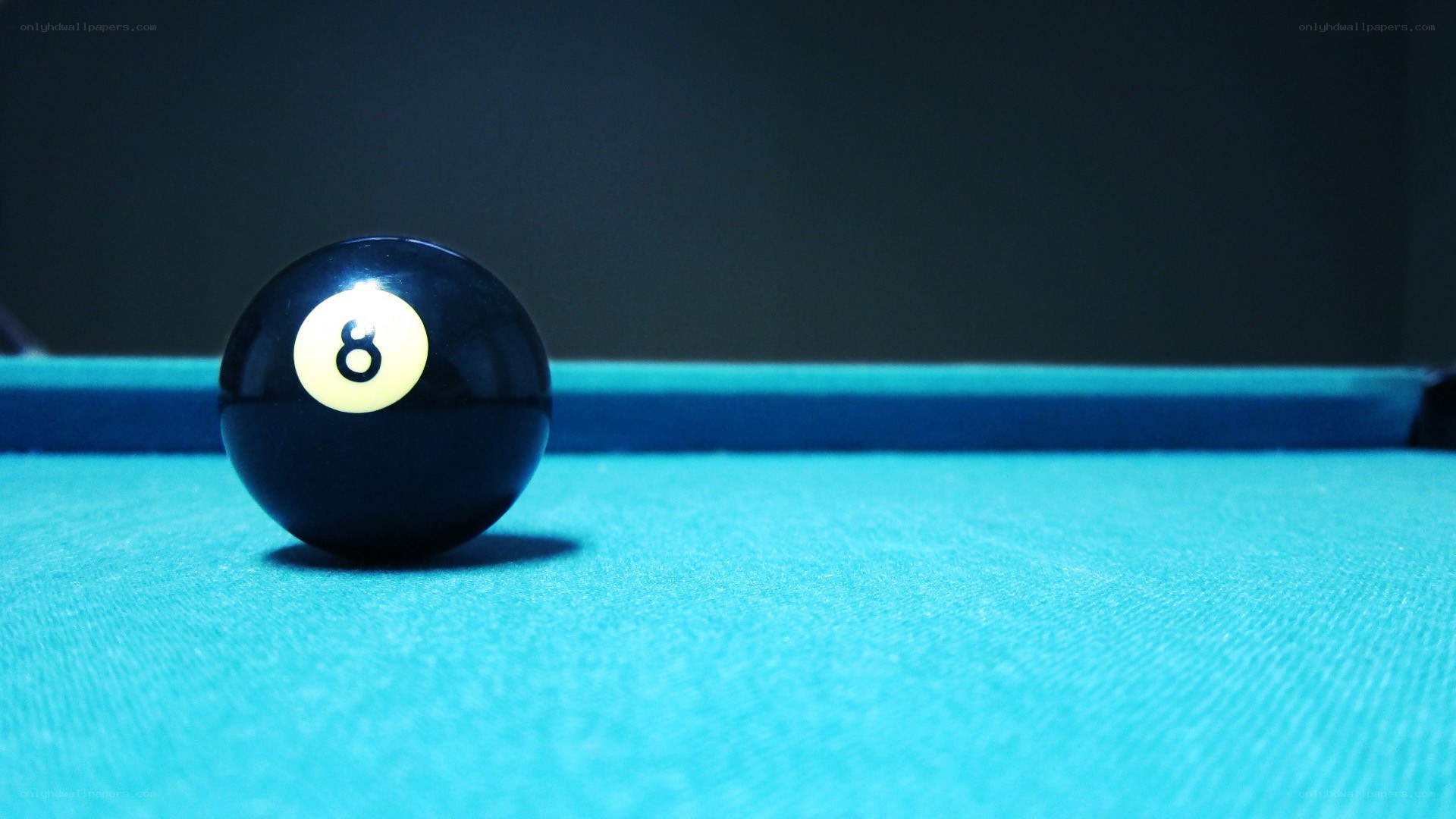 Eight ball on pool table
