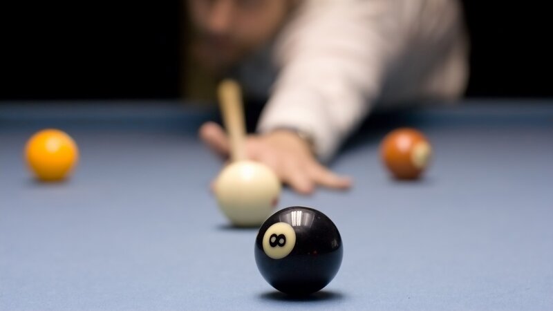Eight Ball on Pool Table — Blue, Focused