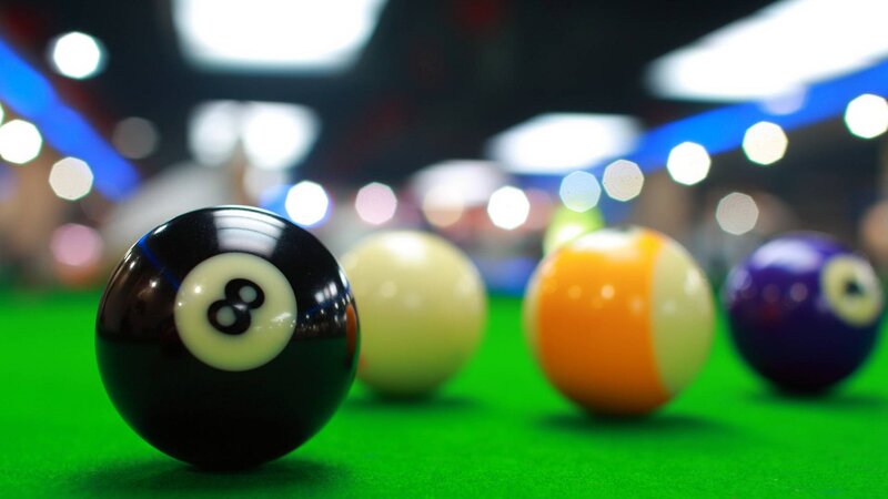 Eight Ball on Pool Table — Green, Focused