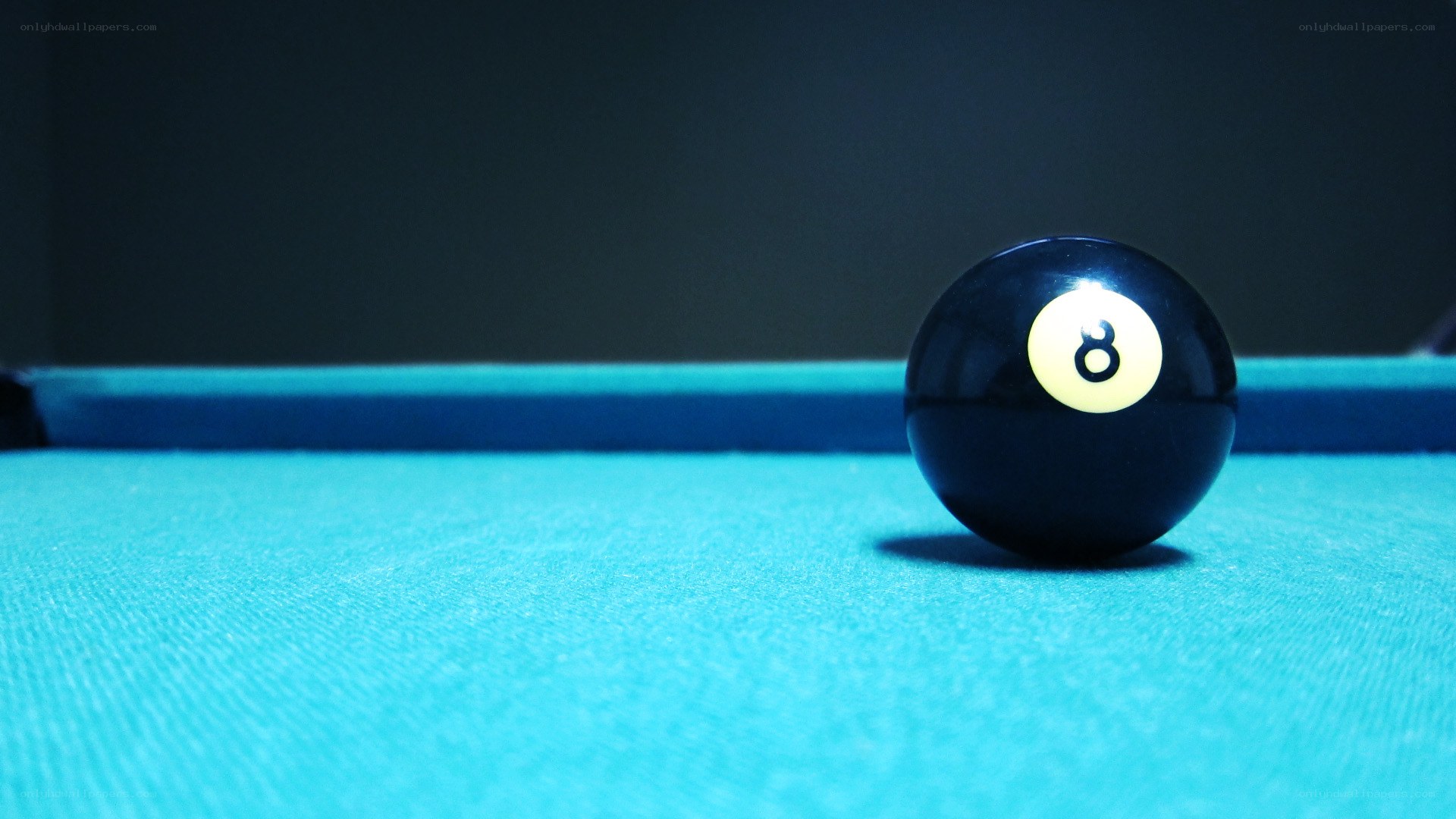 Eight ball on pool table