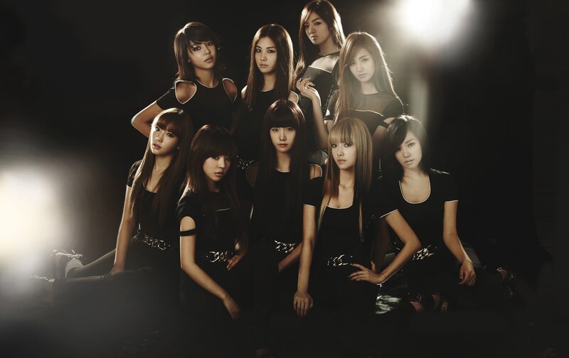 Eight Women in Black Outfits — Dramatic, Photograph