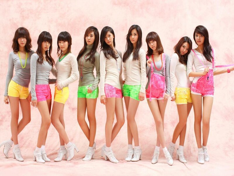 Eight Women in Colorful Outfits