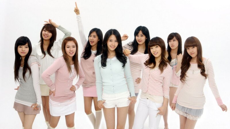 Eight Young Women Posing — White