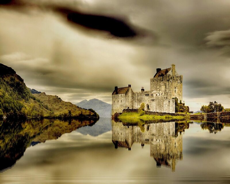 Eilean Donan Castle — Gray, Dramatic, Photograph, Lake, Mountains, Clouds, Green, Brown