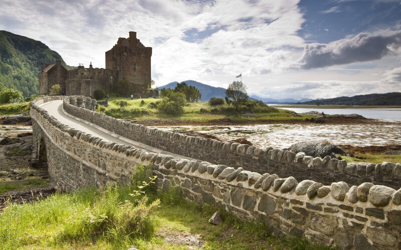 Eilean Donan Castle — Green, Serene, Afternoon, Photograph, Bridge, Mountains