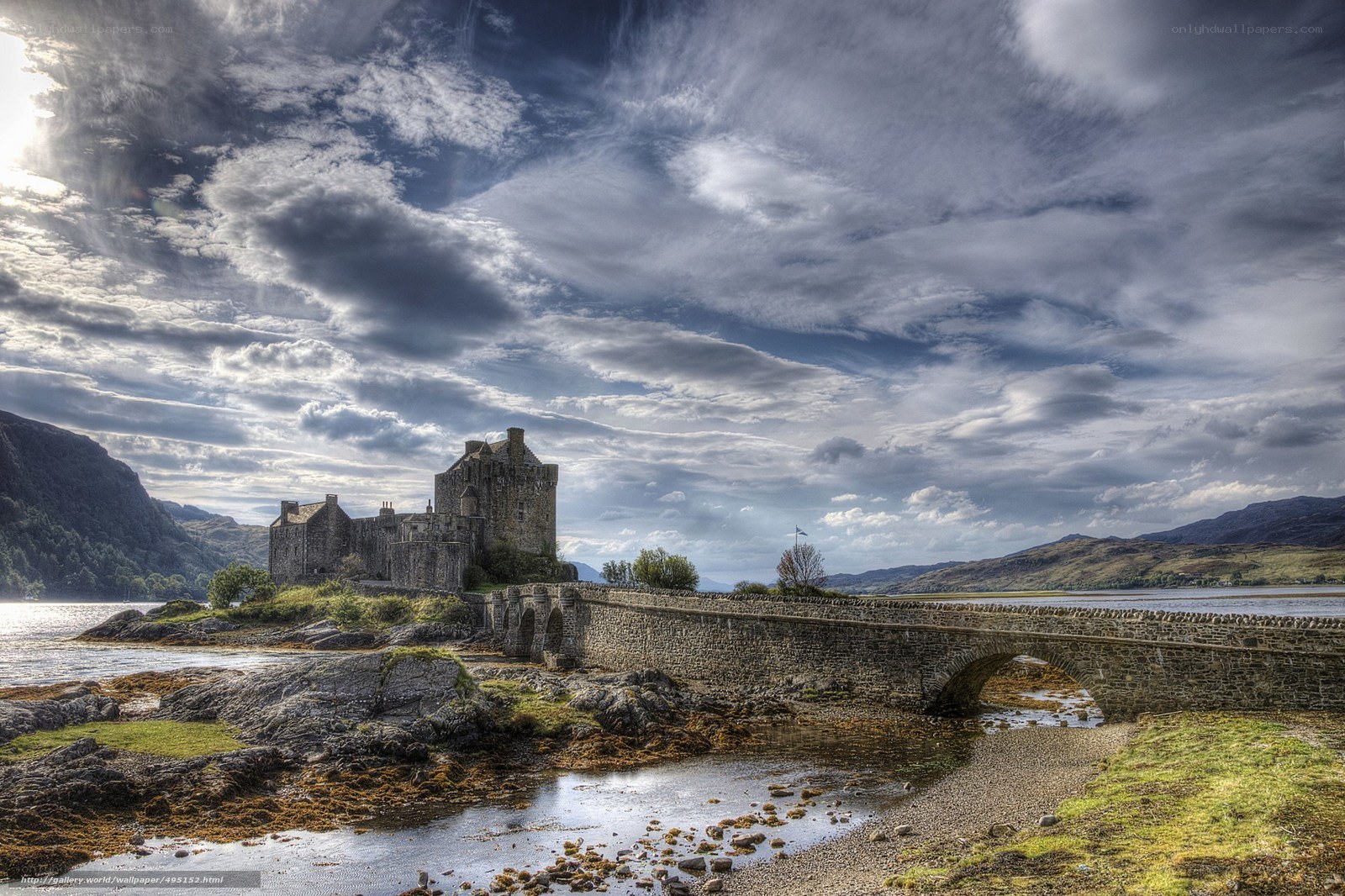 Eilean Donan Castle under dramatic sky