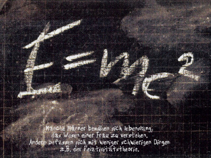 Einstein's equation on chalkboard