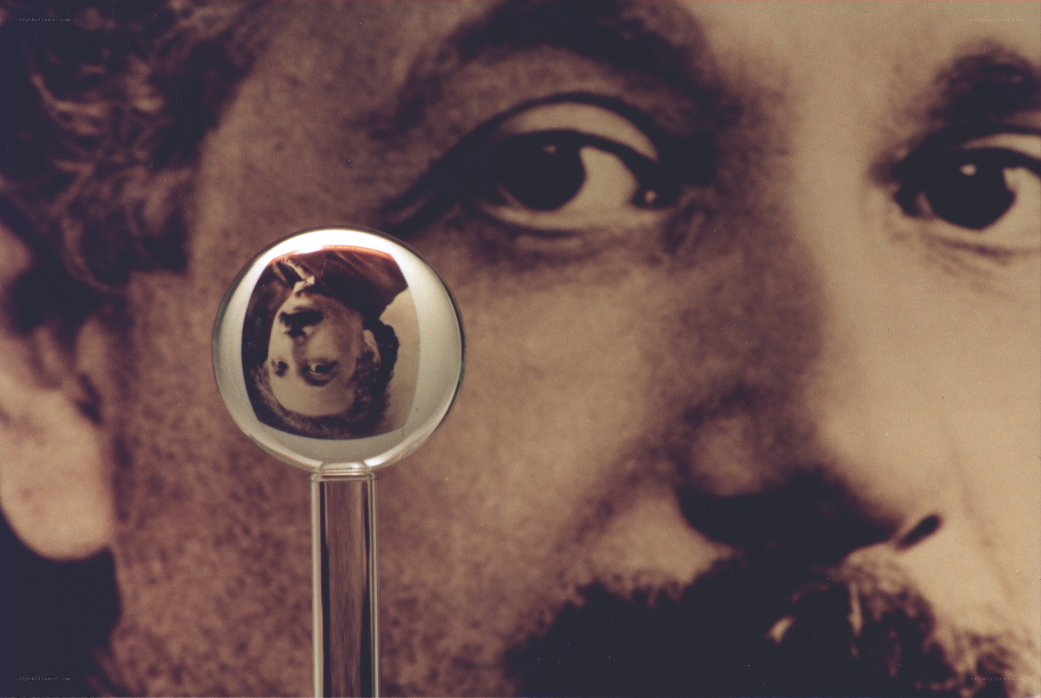 Einstein's face with magnifying glass
