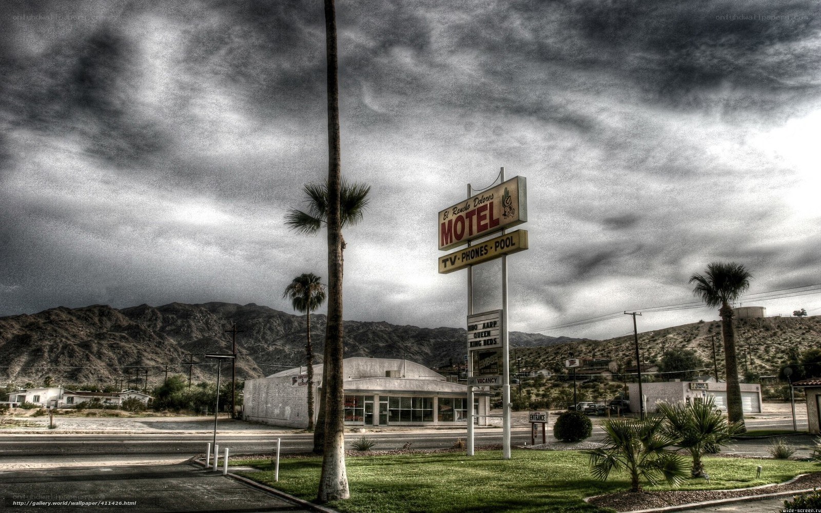 El Rancho Delores Motel sign