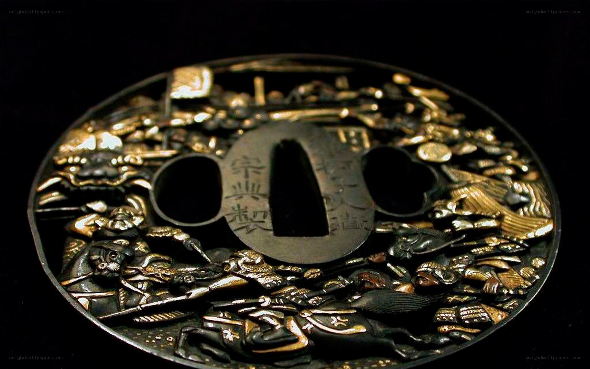 elaborate sword tsuba with battle scene