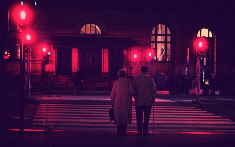 Elderly Couple at Crosswalk