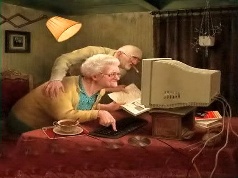 Elderly Couple Using Computer